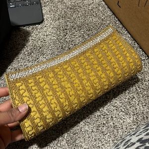Gold unused clutch purse